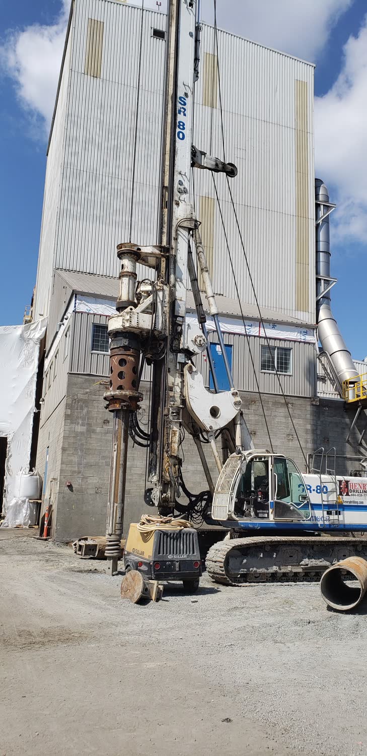 Deep-foundation pile drilling rig at an industrial facility